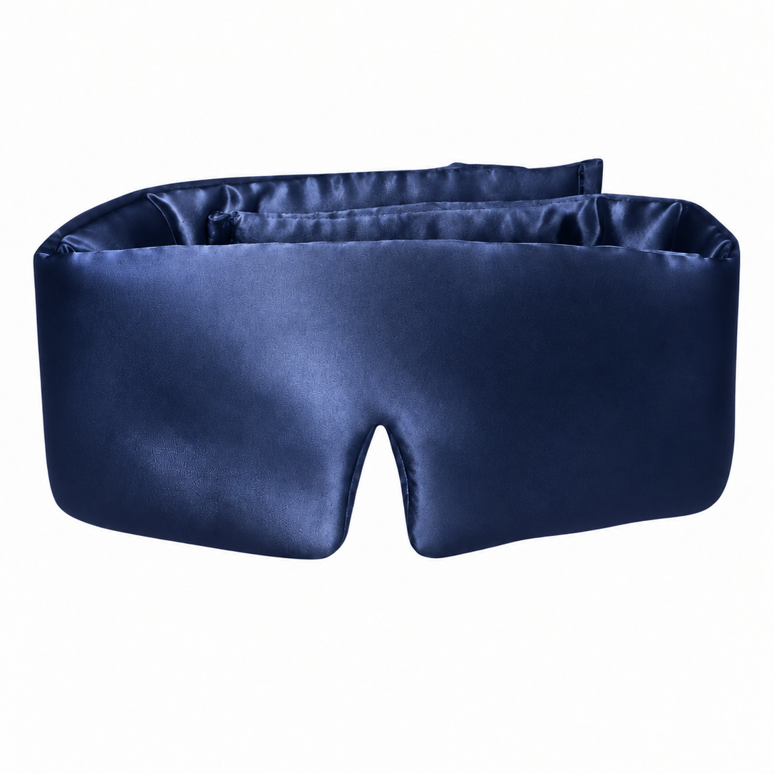 Midnight navy wraparound silk sleep mask with a padded shape and a contoured nose opening